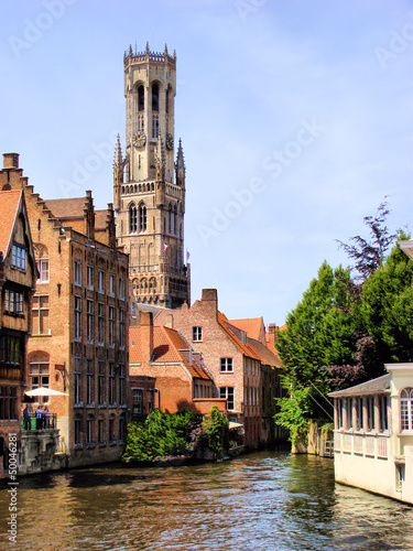 Photo: The famous Belfry and canal scene in Bruges, Belgium The famous Belfry and canal scene in Bruges, Belgium