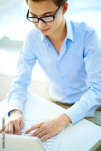 Photo: Guy typing Guy typing