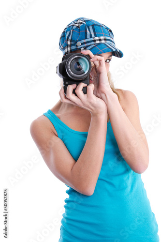 Photo: Fotografin isoliert in Blau mit Spiegelreflexkamera Fotografin isoliert in Blau mit Spiegelreflexkamera