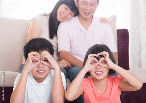 Photo: Southeast Asian family at home Southeast Asian family at home