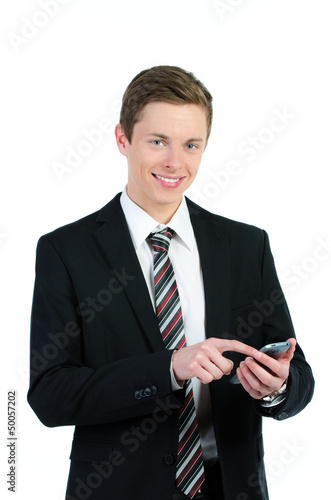 Photo: attraktiver geschäftsmann mit handy attraktiver geschäftsmann mit handy