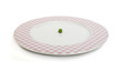 Plate with peas white isolated
