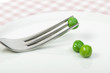 Plate with peas and centimeter measure
