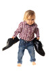 little girl has big shoes isolated on white background