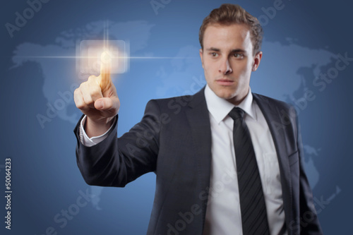 Photo: Man touching display Man touching display