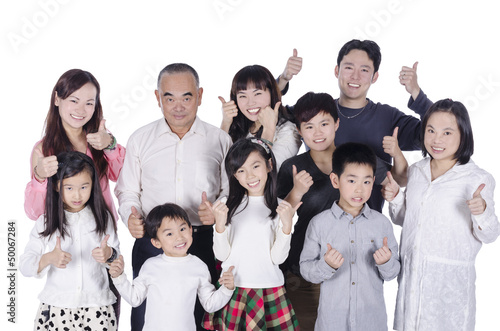 Photo: Multi generation family thumbs up Multi generation family thumbs up