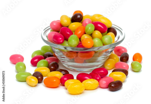 Photo: egg-shaped candies in a glass bowl egg-shaped candies in a glass bowl