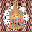Painted wooden board on the tablecloth