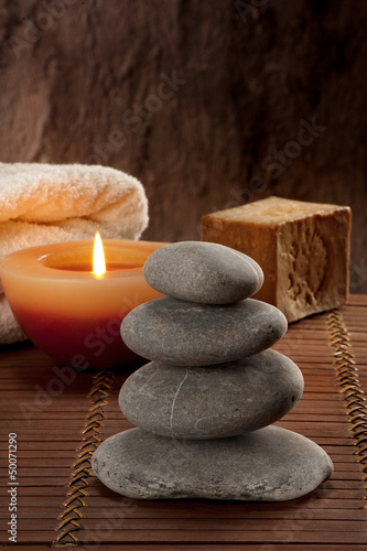 Photo: SPA atmosphere with four stones with candle light and soap SPA atmosphere with four stones with candle light and soap