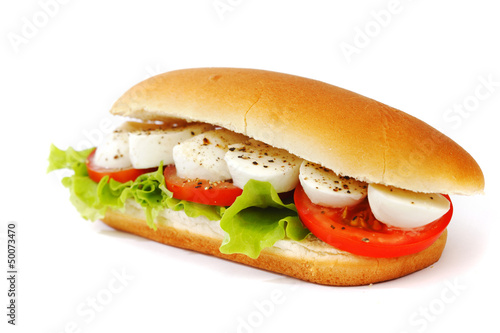 Photo: Sandwich with mozzarella tomato and salad Sandwich with mozzarella tomato and salad