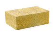 Piece of yellow fiberglass insulation mat