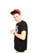 Smiling  break dance dancer posing on a white background