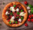 Delicious italian pizza served on wooden table
