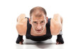 Masculine man doing pushups.