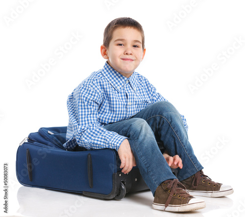 Photo: Little boy with suitcase Little boy with suitcase