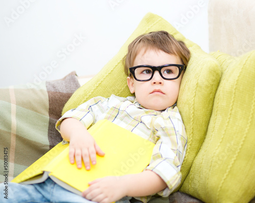Photo: Little child with book Little child with book