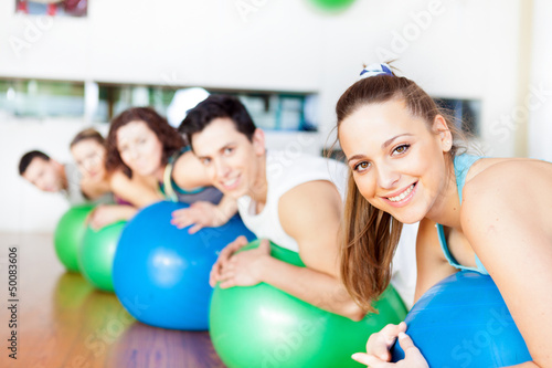 Photo: Group of people in a class of Pilates at the gym Group of people in a class of Pilates at the gym