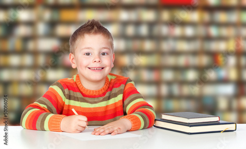 Photo: Elementary schooler doing homework Elementary schooler doing homework