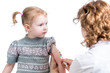 doctor vaccinating child isolated on a white