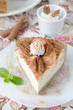 piece of cheesecake with apples and pecans top view