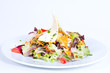 Salad with fresh vegetables and cheese.