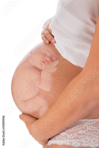 Photo: Unborn baby in pregnant belly Unborn baby in pregnant belly