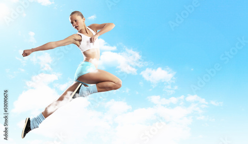 Photo: Image of sport woman jumping Image of sport woman jumping