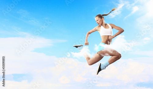Photo: Image of sport woman jumping Image of sport woman jumping