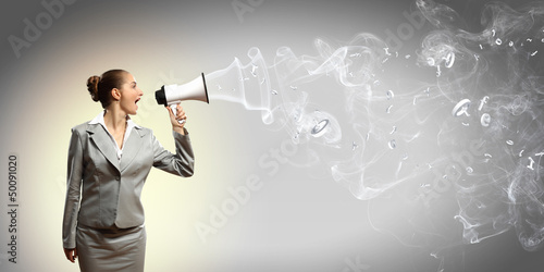 Photo: businesswoman with megaphone businesswoman with megaphone