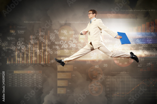 Photo: Image of running businessman Image of running businessman