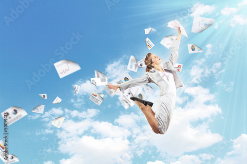 Photo: Image of jumping businesswoman Image of jumping businesswoman