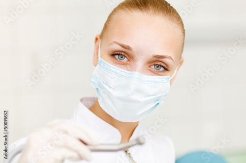 Photo: A portrait of a dental worker A portrait of a dental worker