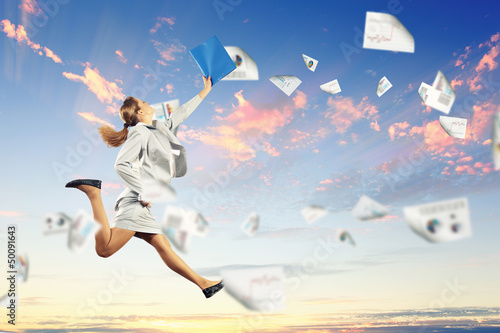 Photo: Image of jumping businesswoman Image of jumping businesswoman