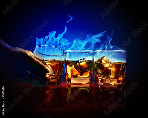 Photo: Three glasses of burning yellow absinthe Three glasses of burning yellow absinthe