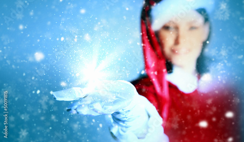Photo: Portrait of girl wearing santa claus clothes Portrait of girl wearing santa claus clothes