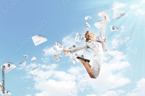 Photo: Image of jumping businesswoman Image of jumping businesswoman