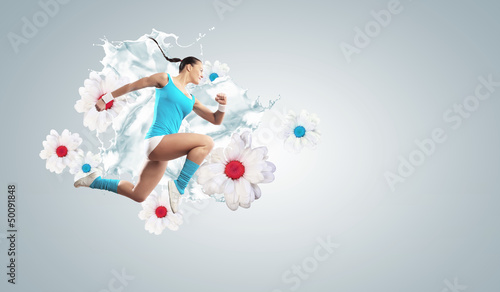 Photo: Image of sport woman jumping Image of sport woman jumping