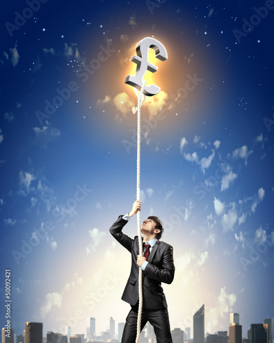 Photo: Image of businessman climbing rope Image of businessman climbing rope
