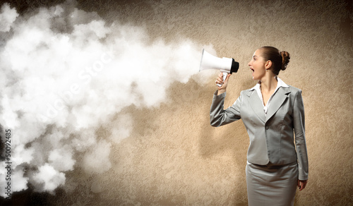 Photo: businesswoman with megaphone businesswoman with megaphone