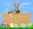 Cartoon Easter bunny pointing