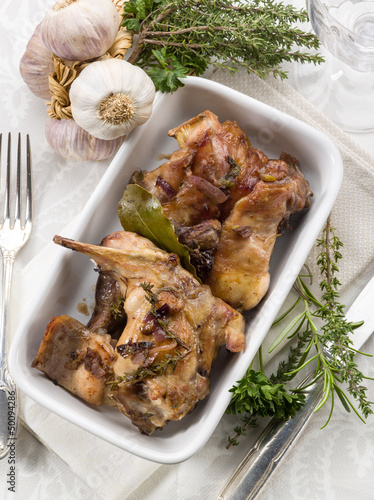 Photo: roasted rabbit with herbs and garlic roasted rabbit with herbs and garlic