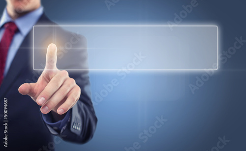 Photo: Man touching display Man touching display