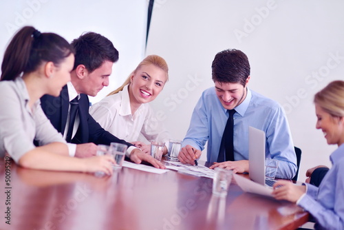 Photo: business people in a meeting at office business people in a meeting at office