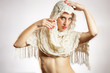 portrait of a pretty brunette with a scarf on her head