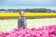 Happy Girl In Tulips
