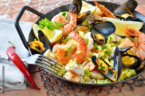 Photo: Paella mit frischen Meeresfrüchten und Huhn Paella mit frischen Meeresfrüchten und Huhn