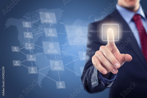 Photo: Man touching display.... in Background Network Man touching display.... in Background Network