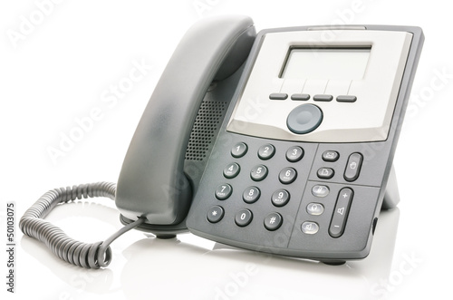 Photo: Telephone isolated over white Telephone isolated over white