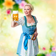 Photo: junge brünette Frau im Dirndl mit Masskrug junge brünette Frau im Dirndl mit Masskrug
