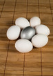 Silver Easter eggs on wooden background
